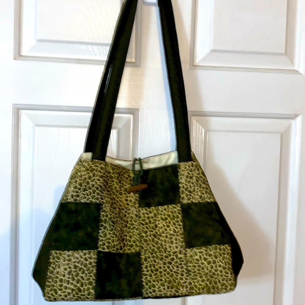Very rare shoulder bag (possibly) hand made. 6”deep and 12” long.